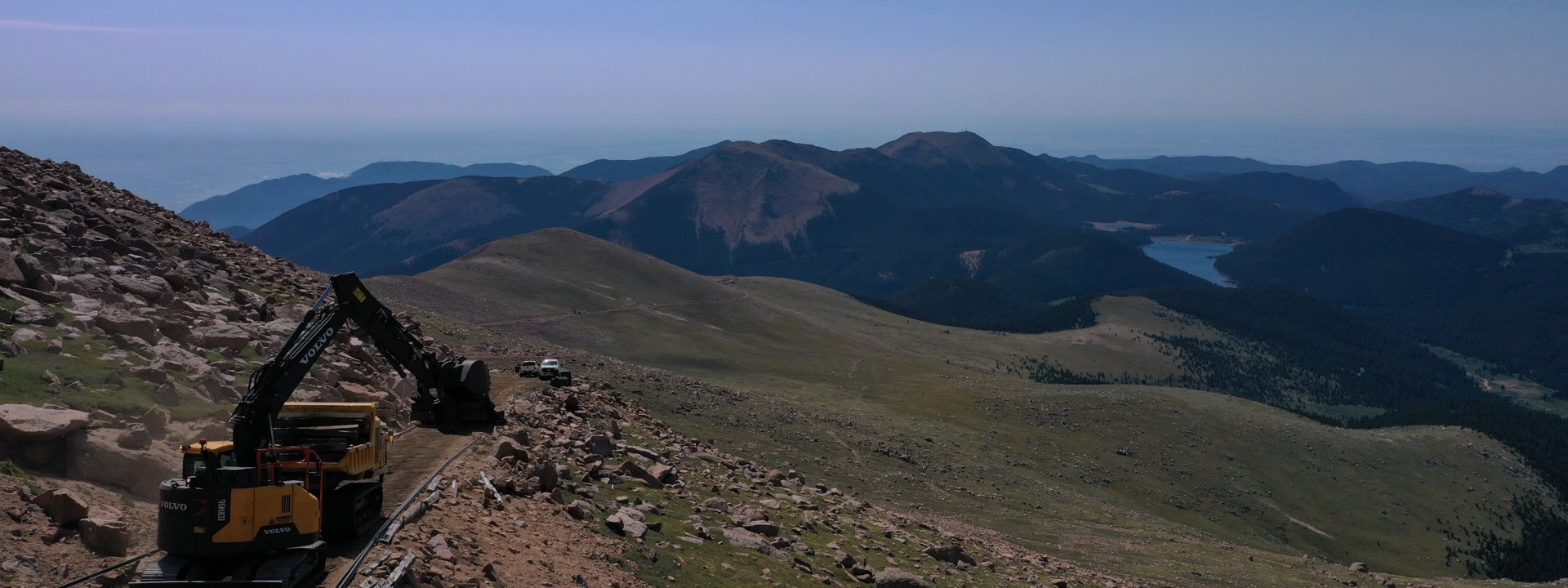 A crane tearing up a railway on Pikes Peak Mountain in Manitou Springs