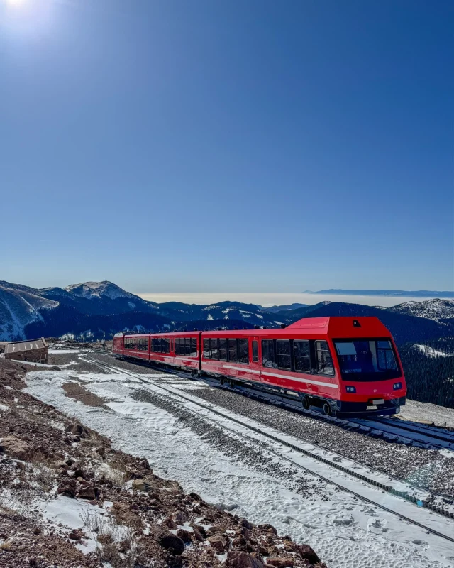 Take in the blue bird skies and low hanging clouds at Windy Point. 

#PikesPeakCogRailway #VisitColorado